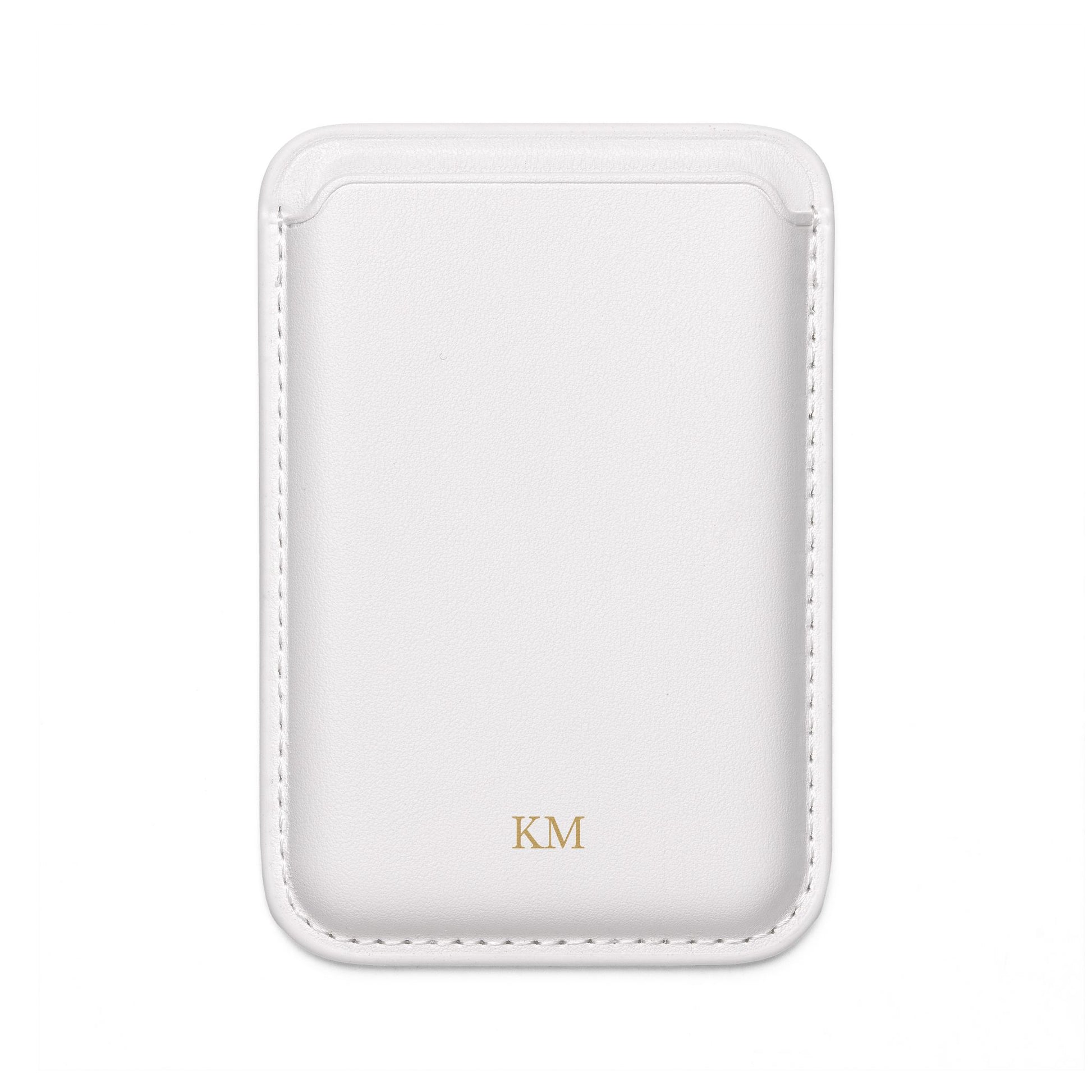 Personalized MagSafe wallet for men in black vegan leather attached to an iPhone