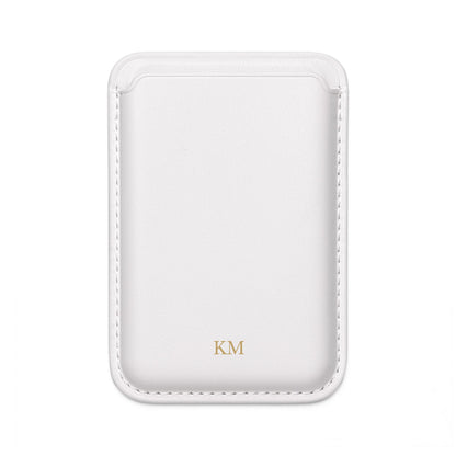 Personalized MagSafe wallet for men in black vegan leather attached to an iPhone