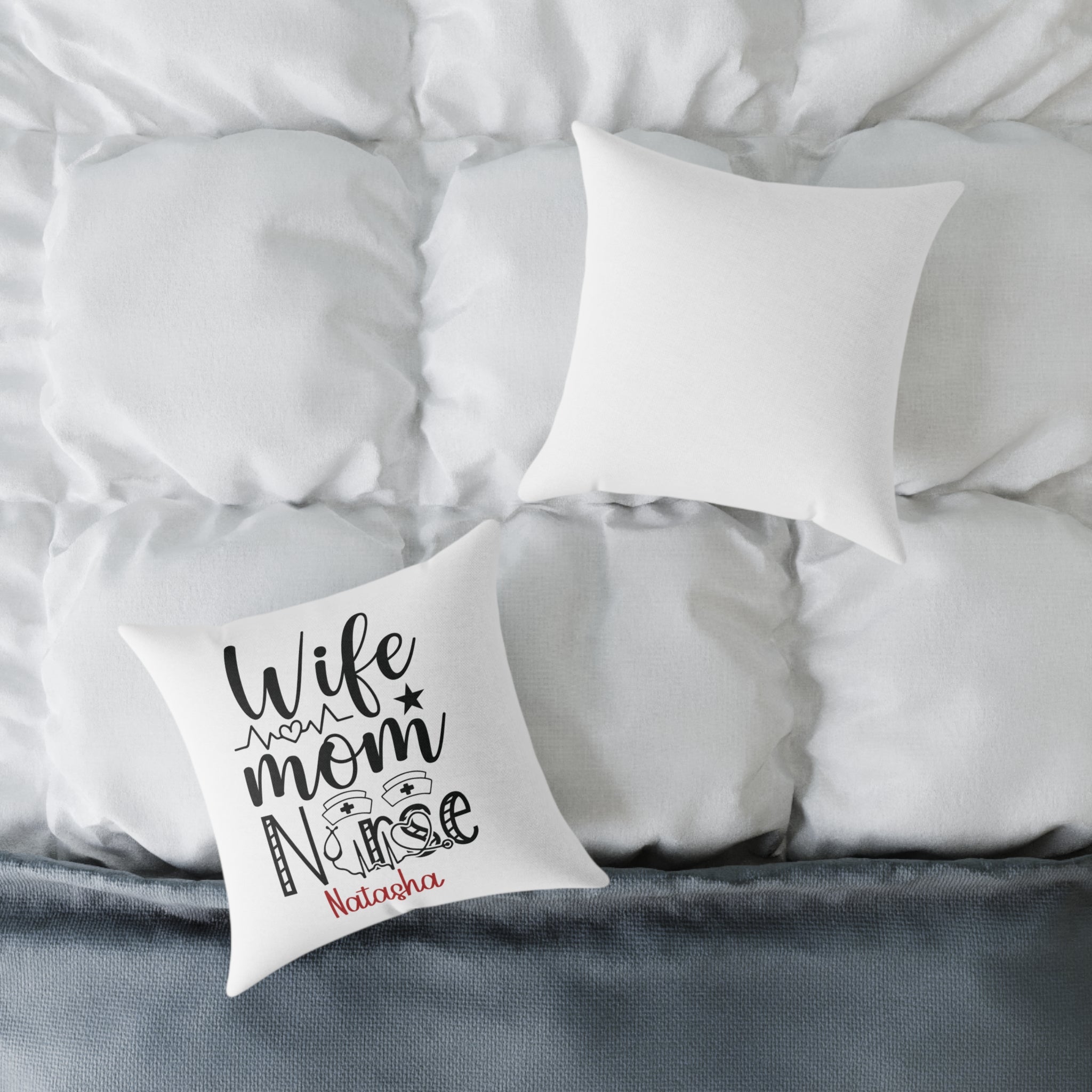Personalized nurse pillow displayed on a bed